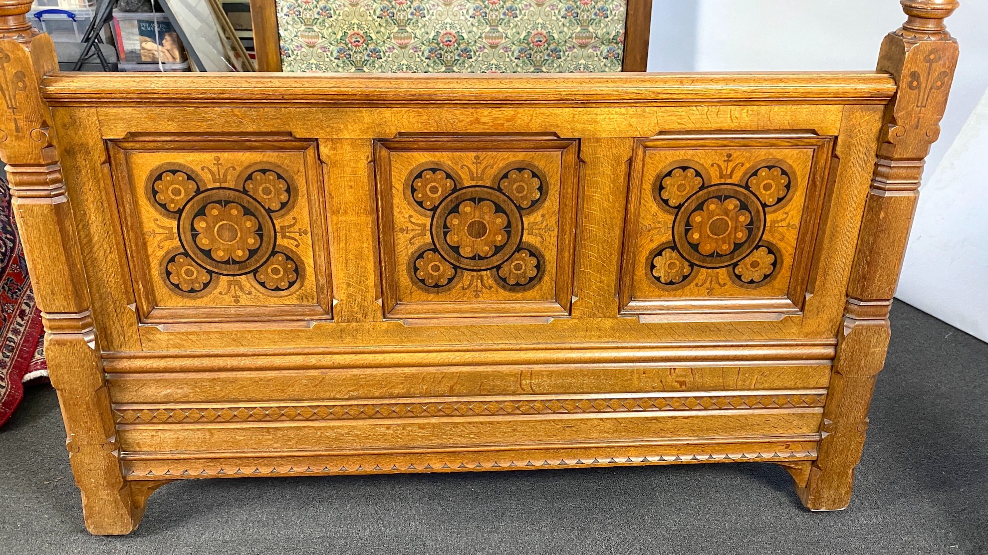 Charles Bevan probably for Marsh & Jones, Leeds. An Arts & Crafts pollard oak and marquetry half tester bed, width 156cm length 213cm height 226cm